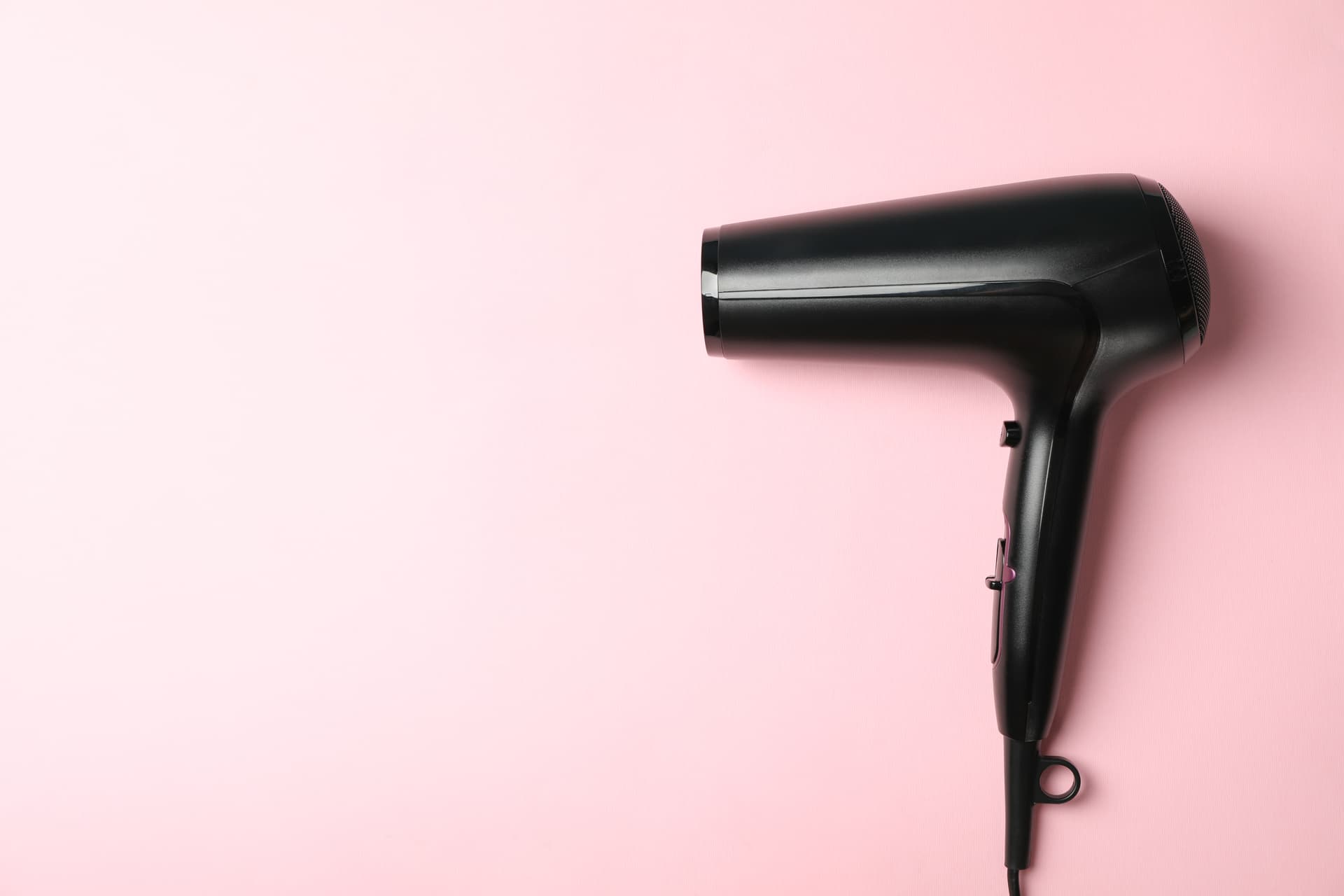 black-hair-dryer-on-pink-background-space-for-tex-2026-01-09-07-28-50-utc.jpg