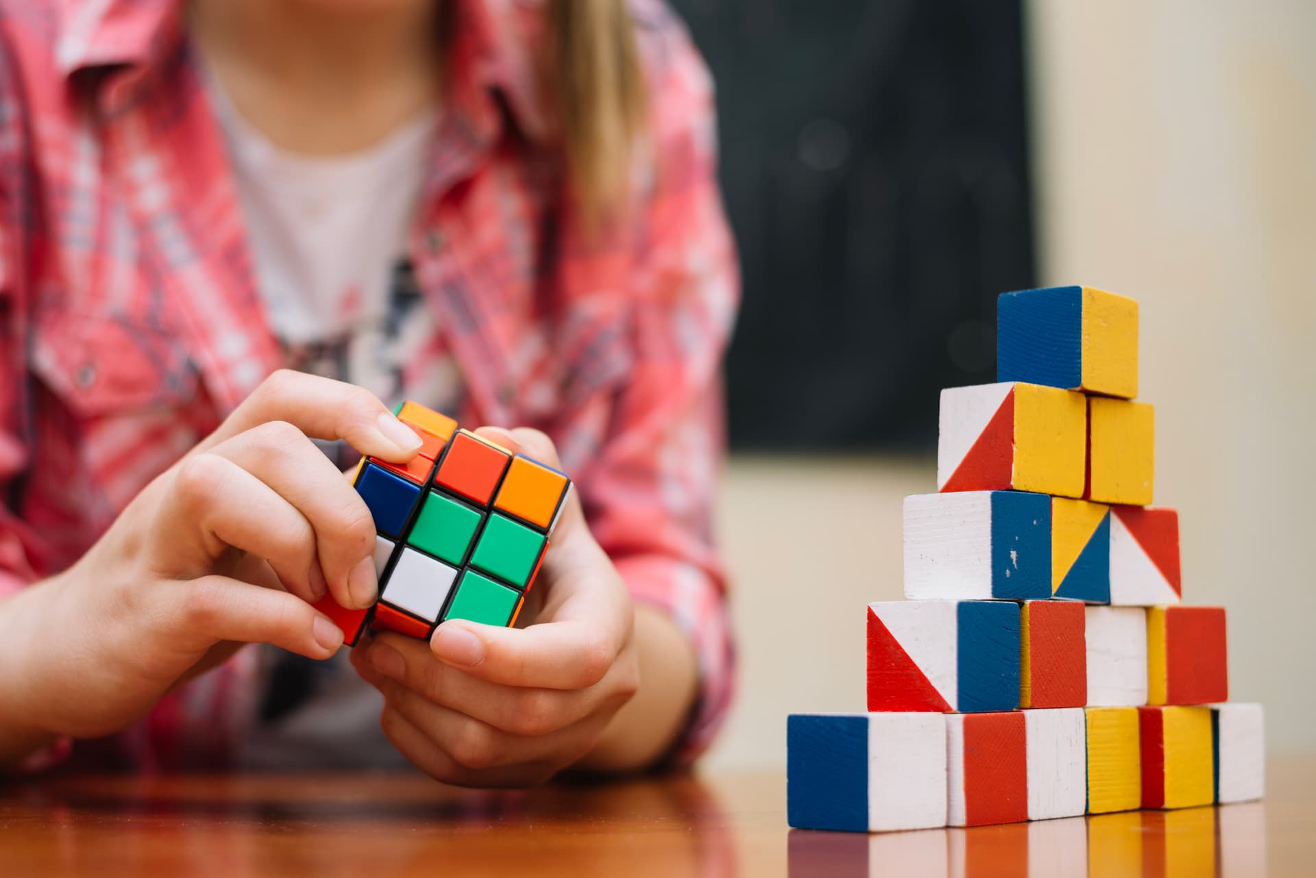 girl-playing-with-cube-puzzle.jpg